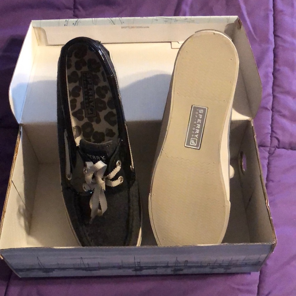 New in the box, never worn. Size 7M